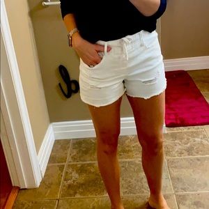 White, distressed elastic waist shorts